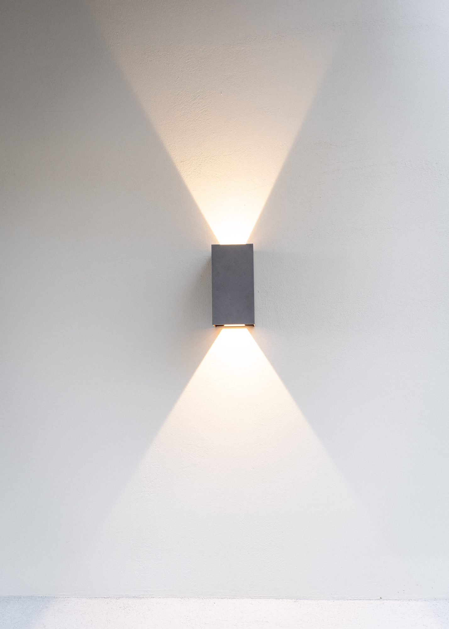 Wall sconce — softly diffused up-and-down light
