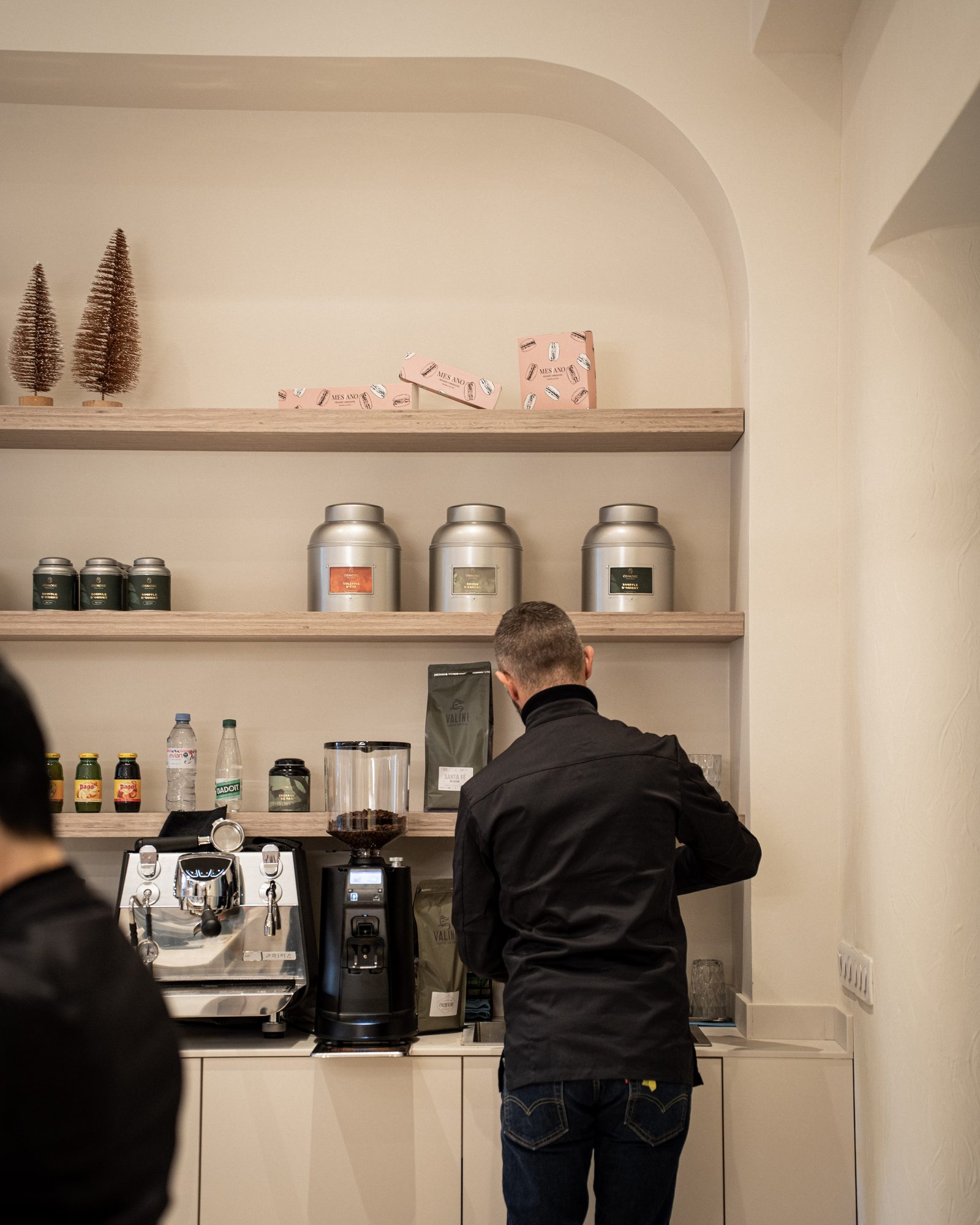 Barista station with espresso machine and tea tins