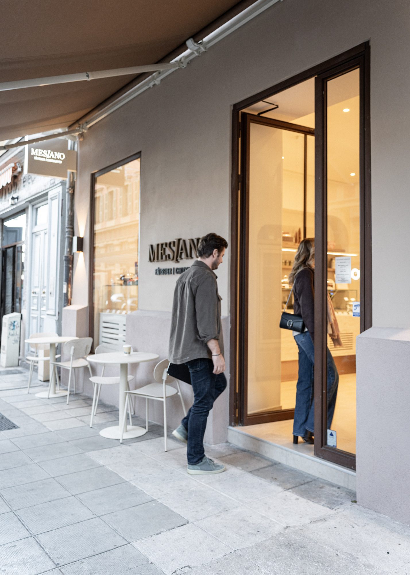 Storefront — a customer entering the boutique