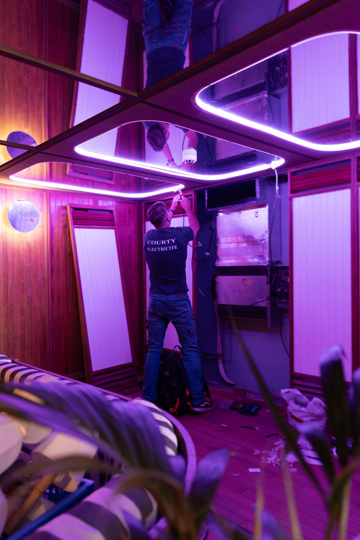 Stars of Monaco — intimate alcove with neon detail